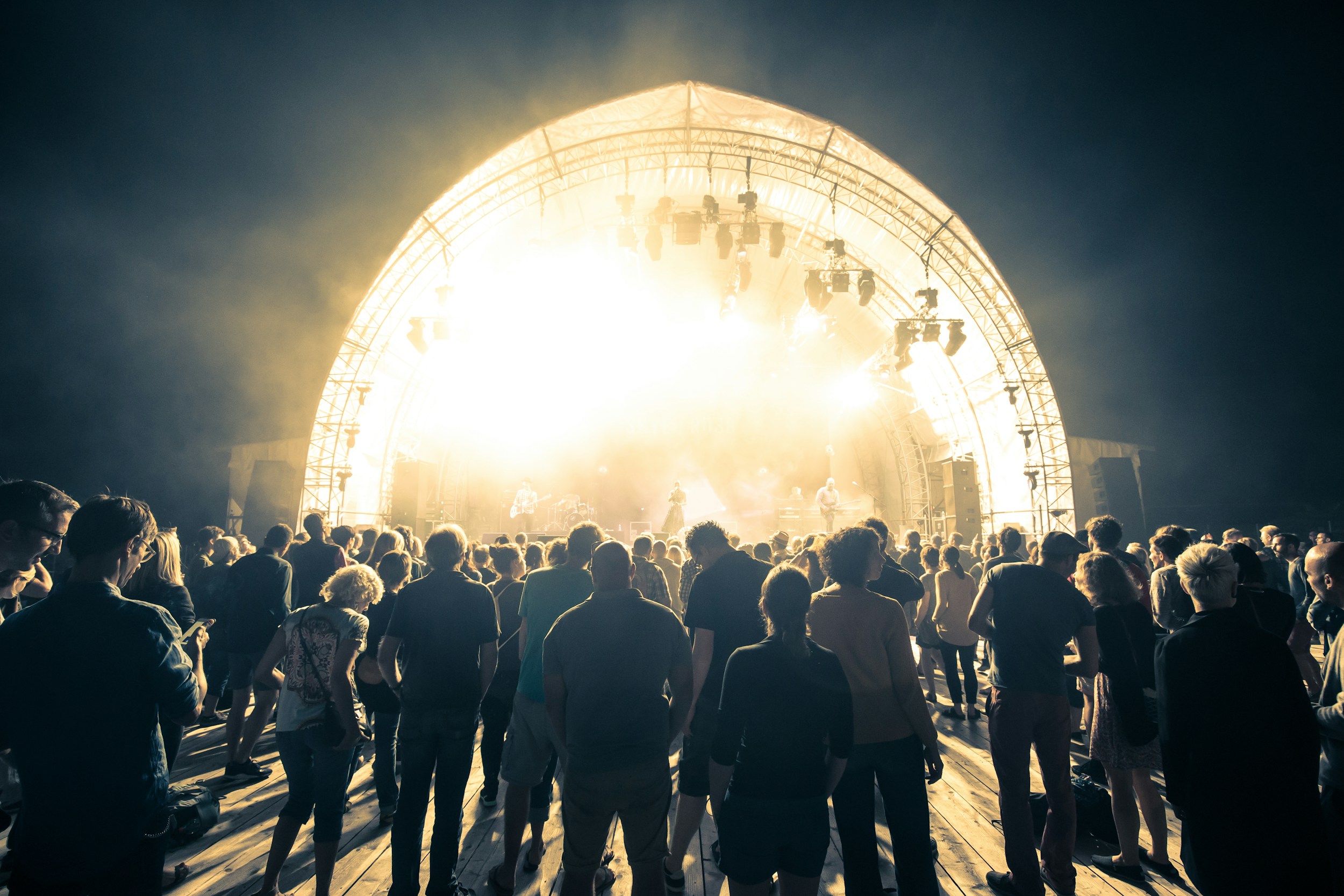 concert stage lights crowd silhouette