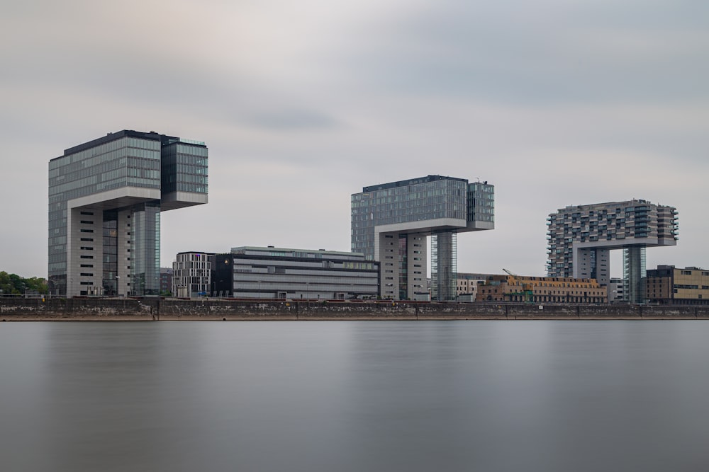 city skyline across body of water during daytime