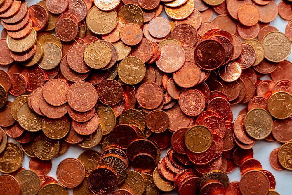 pile of round silver and gold coins