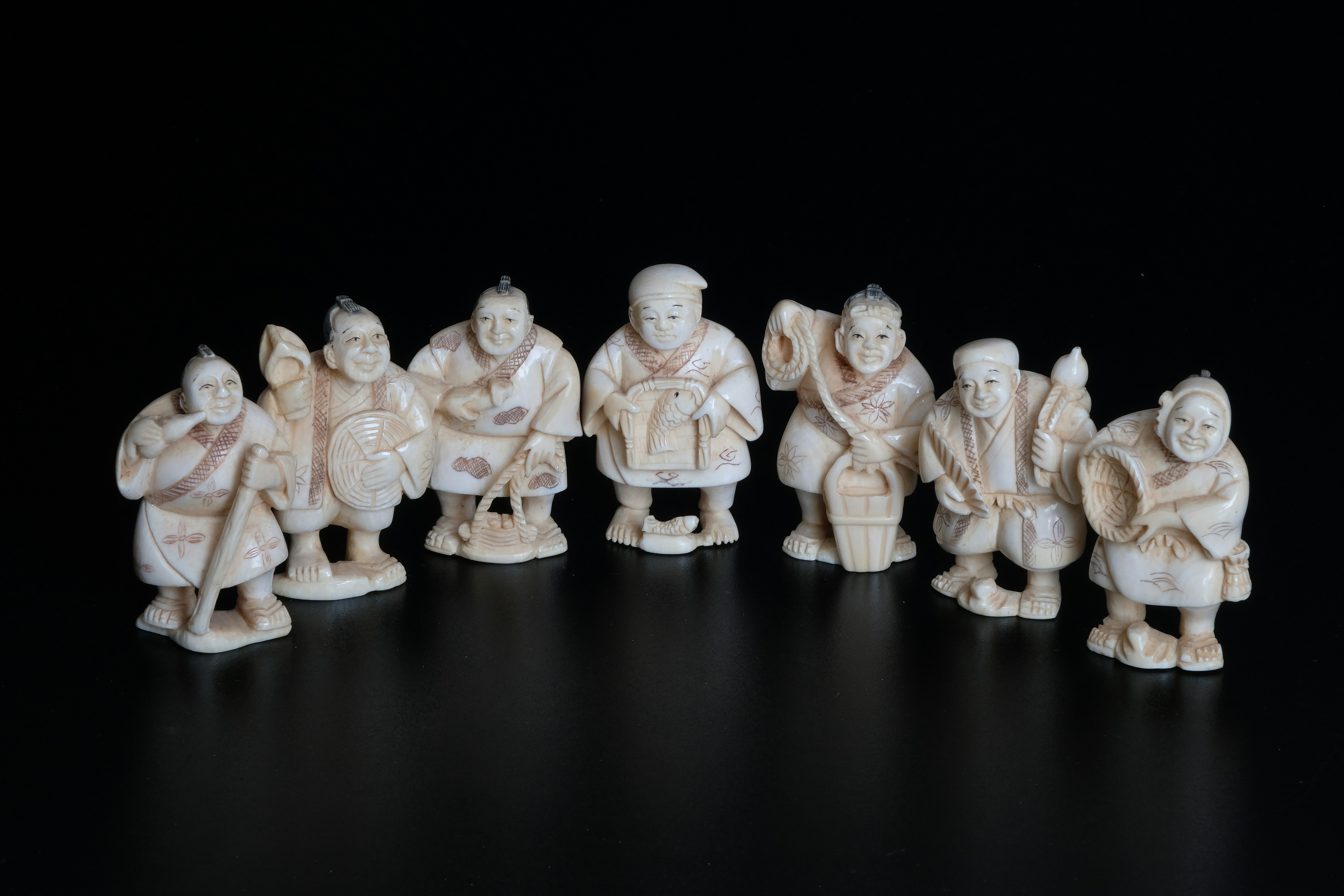 white and brown ceramic figurines