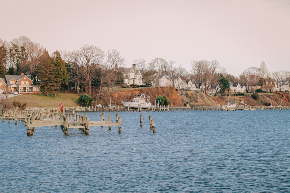 people riding on boat on lake during daytime