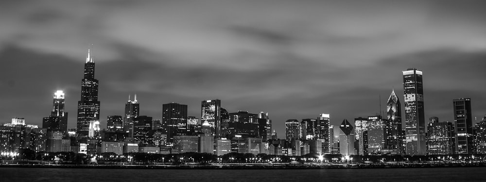 grayscale photo of city buildings