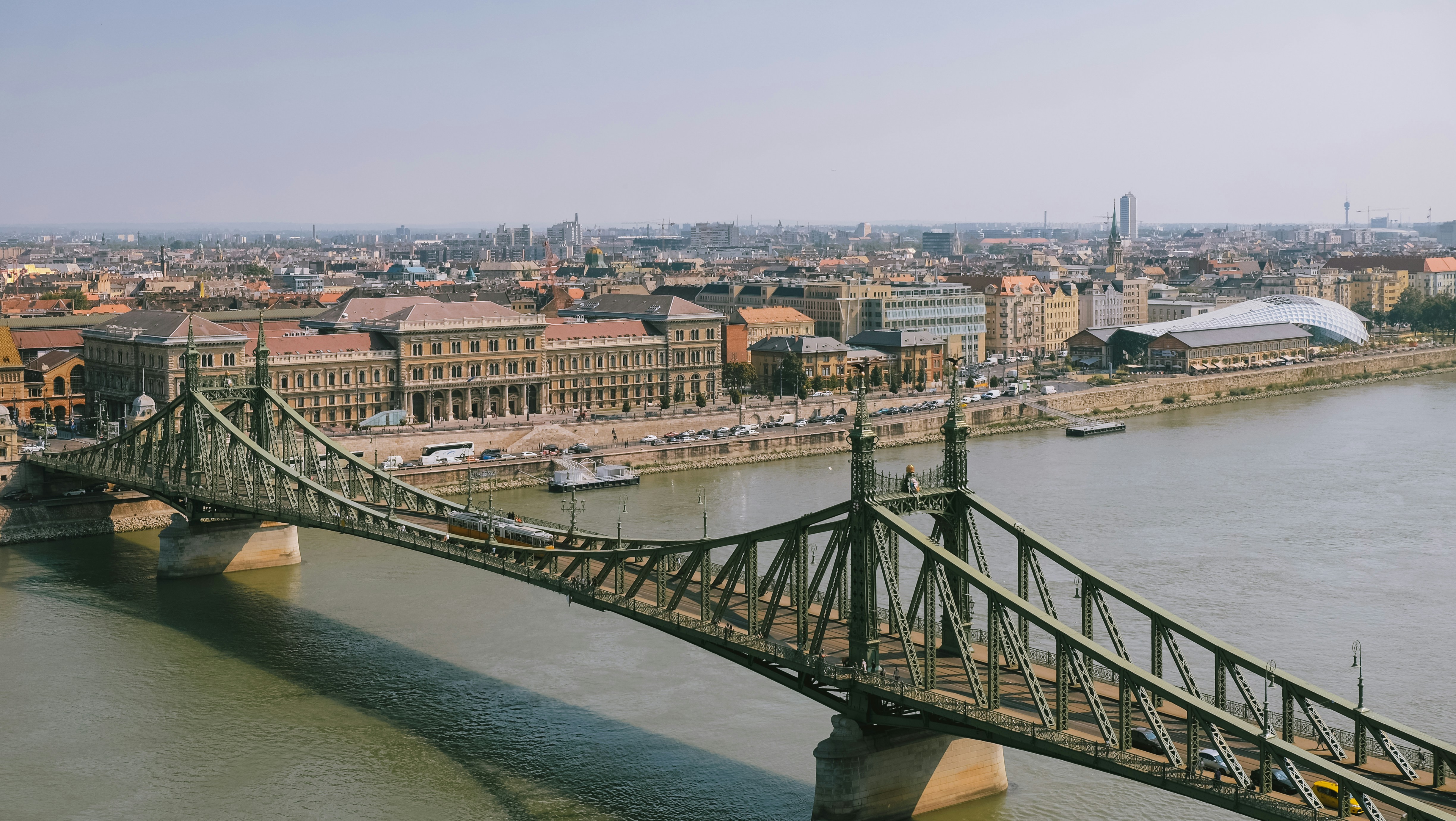 gray concrete bridge over river during daytime