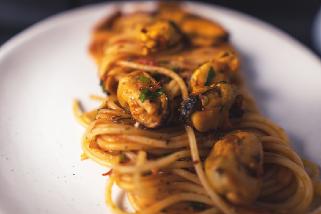 pasta dish on white ceramic plate, Mussel linguine
