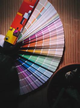 multi colored umbrella on brown wooden table