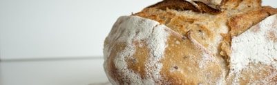 bread on white and blue floral textile