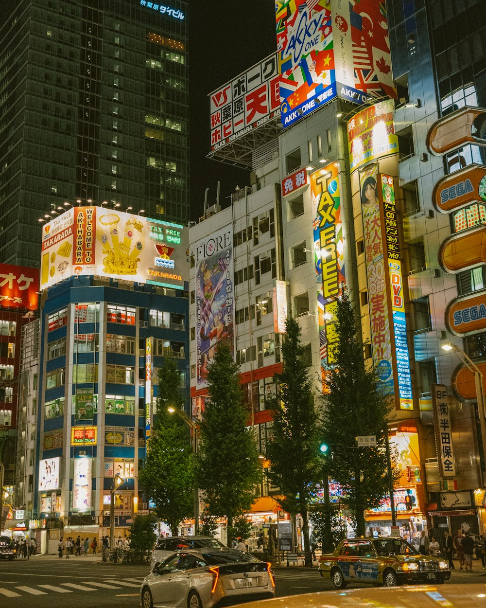 people walking on street during nighttime