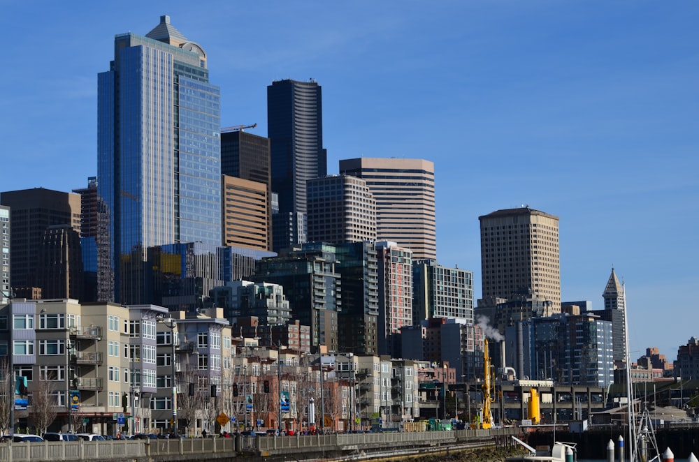 city skyline under blue sky during daytime