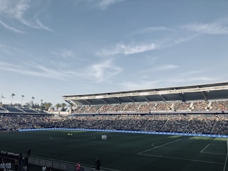 a stadium full of people watching a soccer game