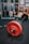 red and silver dumbbell on black surface