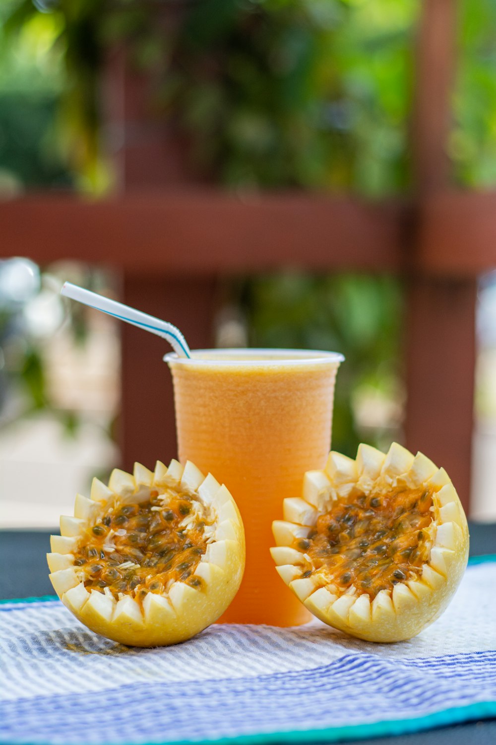 sliced yellow fruit on blue plate