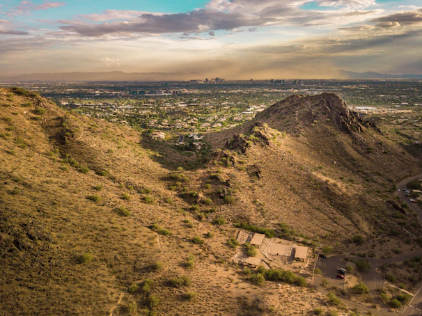 Aerial view of a beautiful desert neighborhood at golden hour.