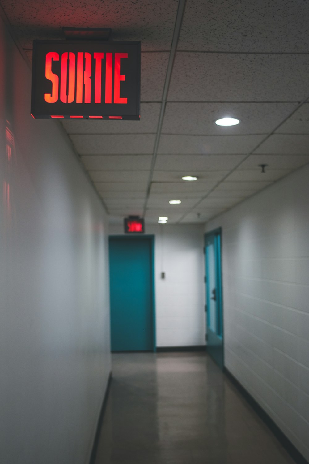 red and white exit sign