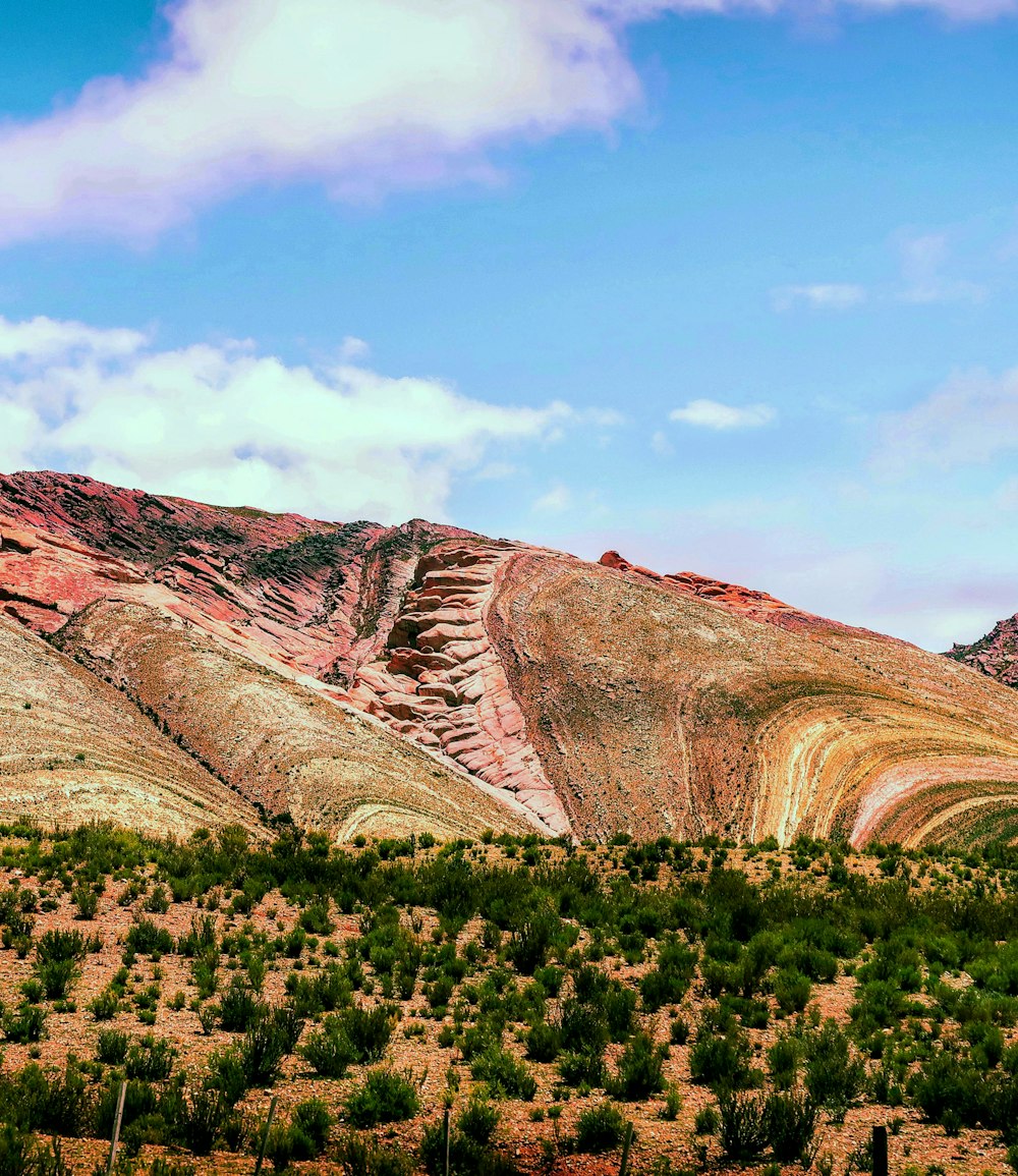 brown rock formation under blue sky during daytime