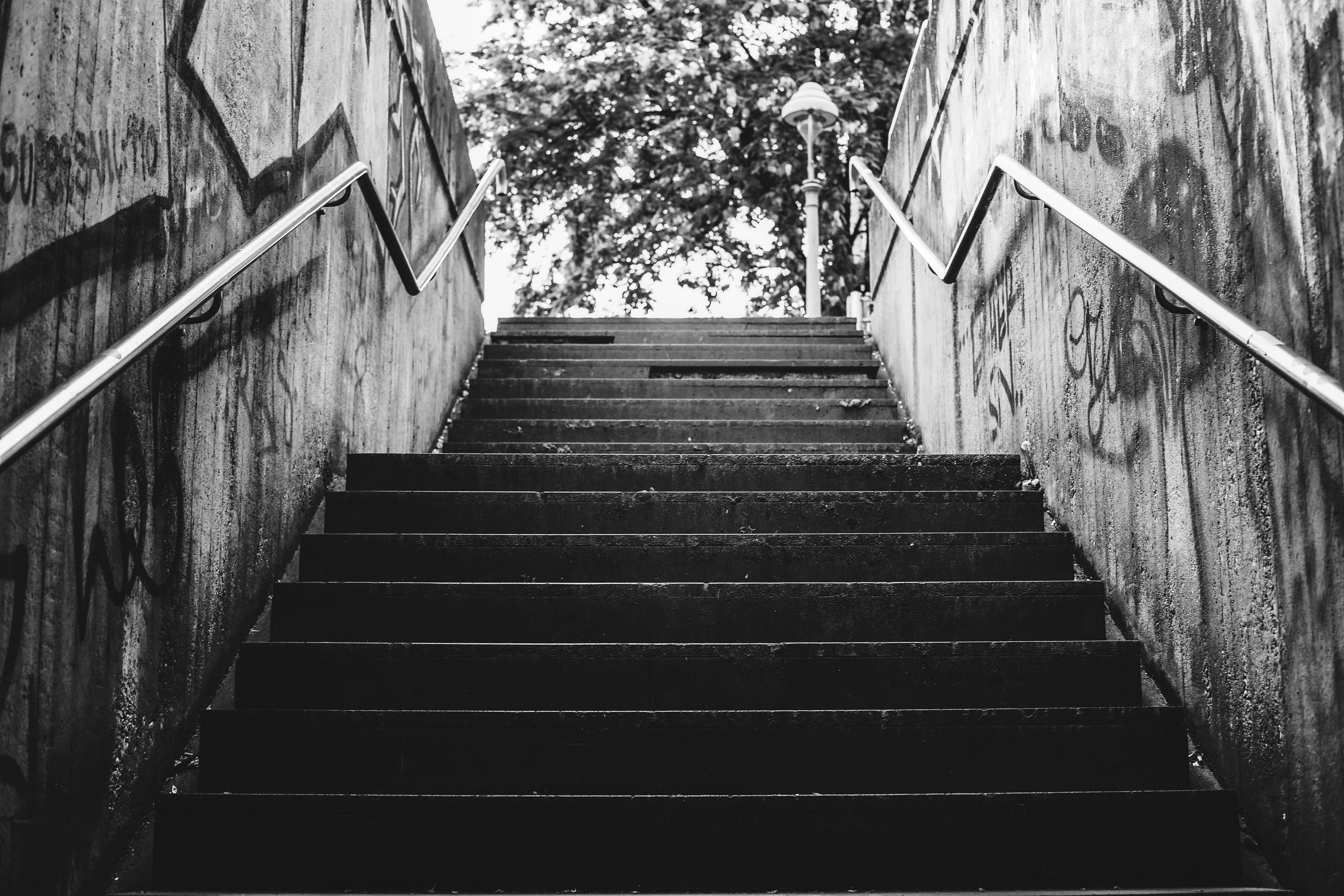 grayscale photo of concrete staircase