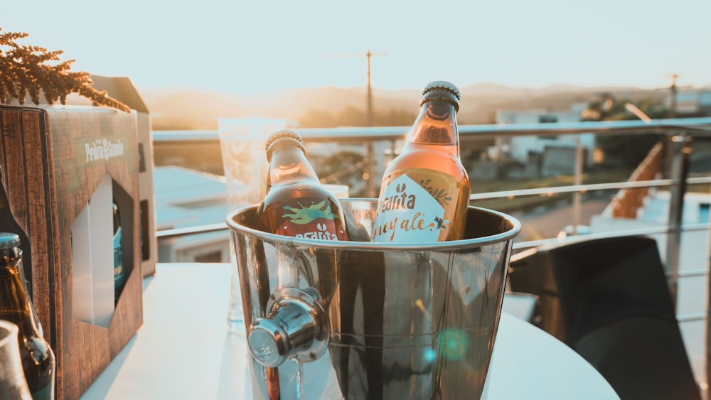 clear glass bottle on table