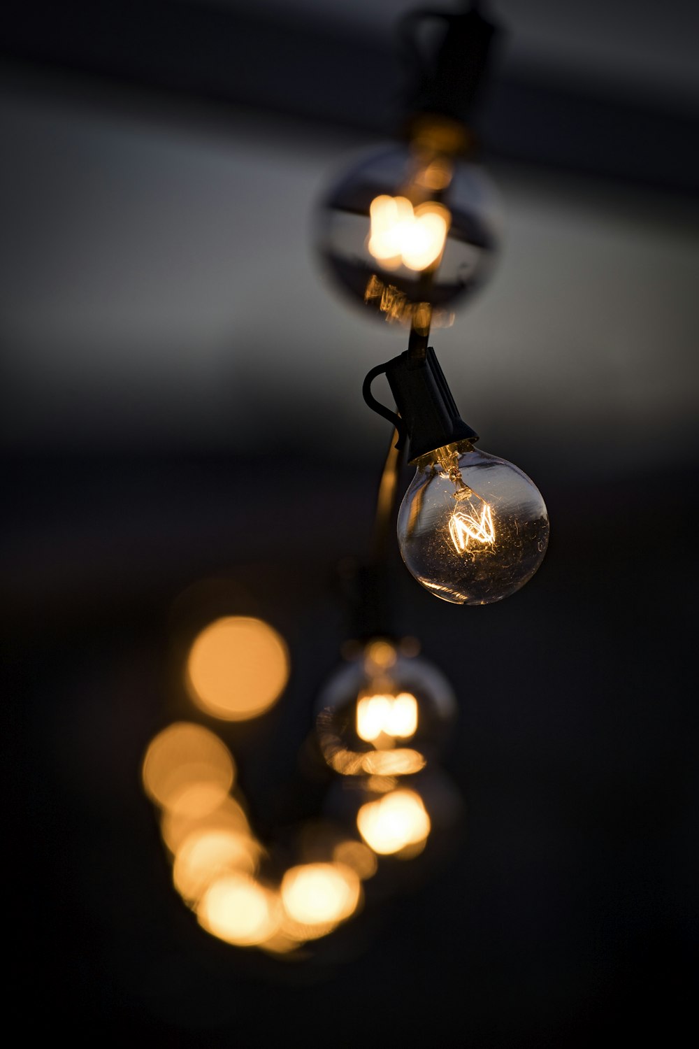 selective focus photography of pendant lamp