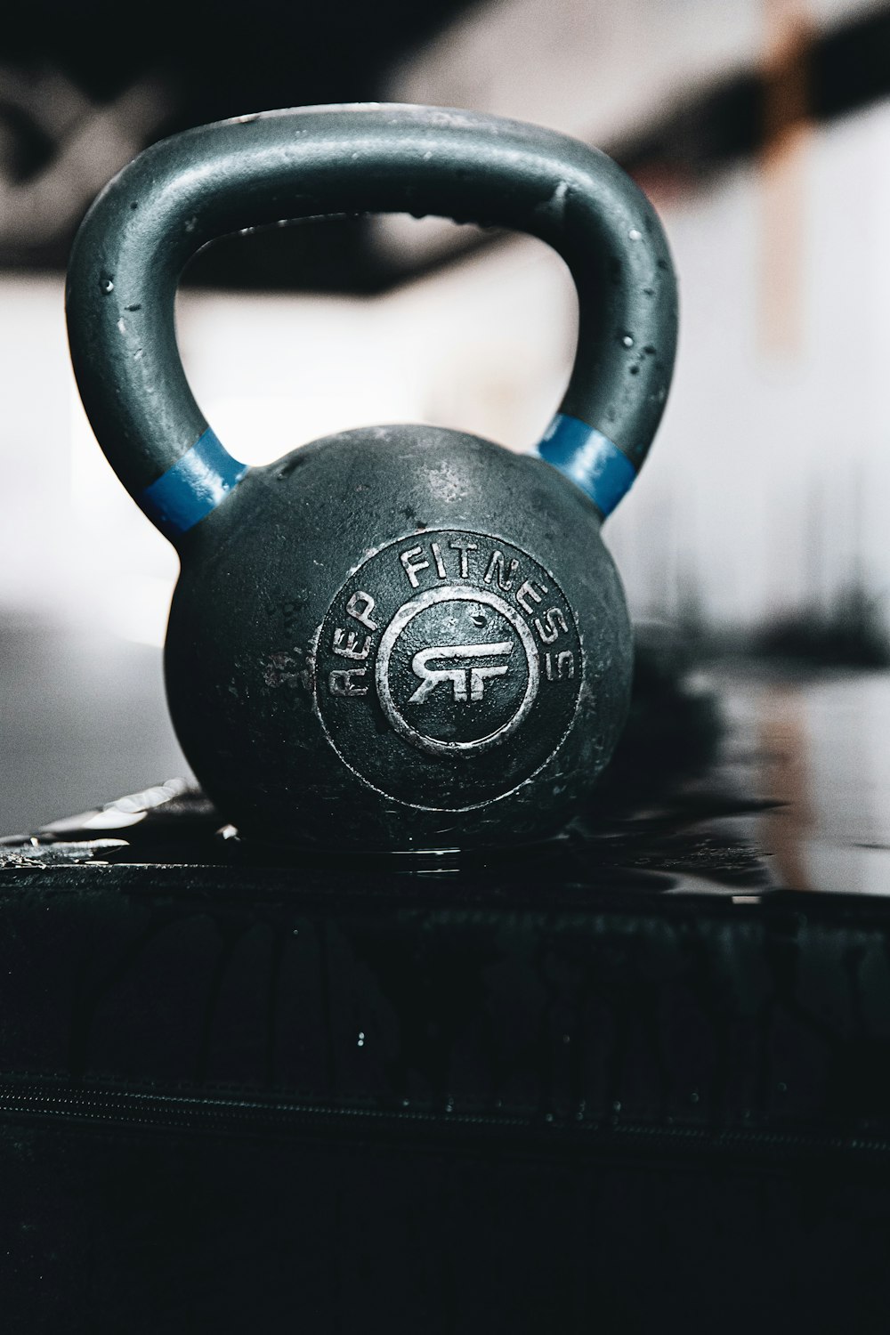 black kettle bell on black table