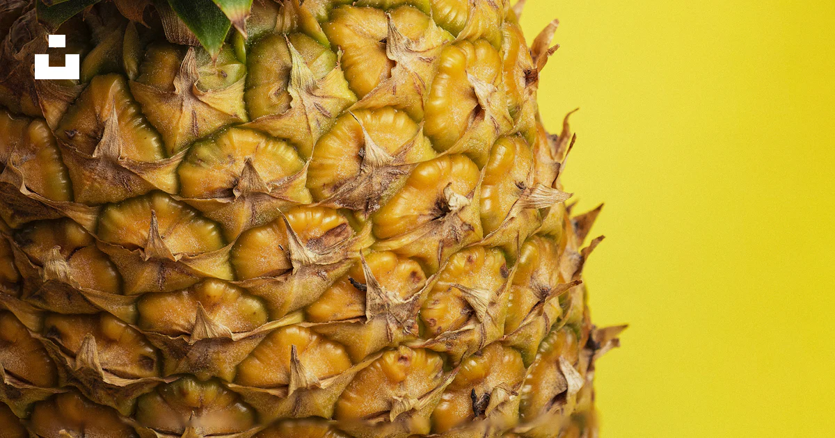 Pineapple fruit on yellow surface photo – Free Yellow Image on Unsplash