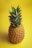 pineapple fruit with yellow background