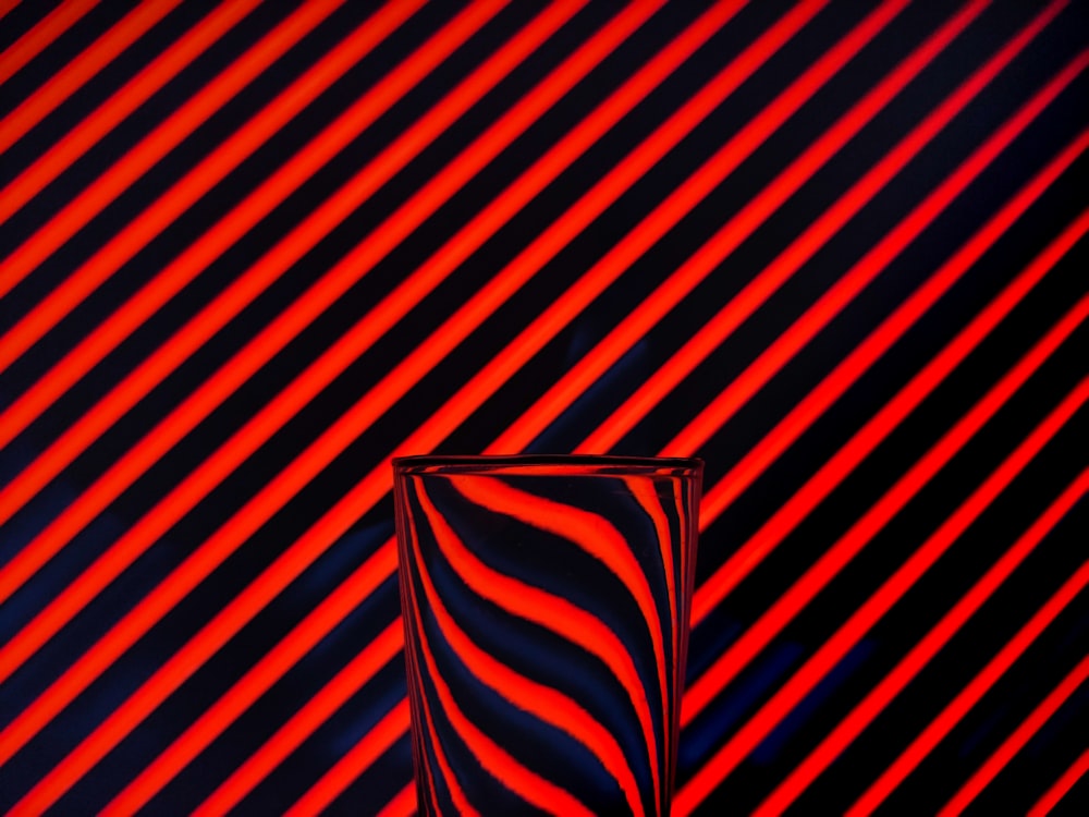 red and black striped textile