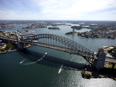 aerial view of bridge over body of water during daytime