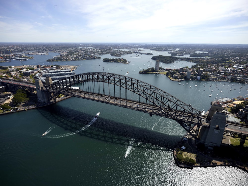 aerial view of bridge over body of water during daytime