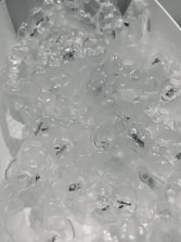 black and white stones on white surface