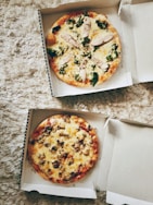 pizza on white cardboard box