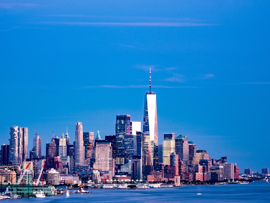 city skyline under blue sky during daytime