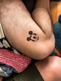 A vibrant tattoo in progress featuring a beloved anime character on someone's arm.