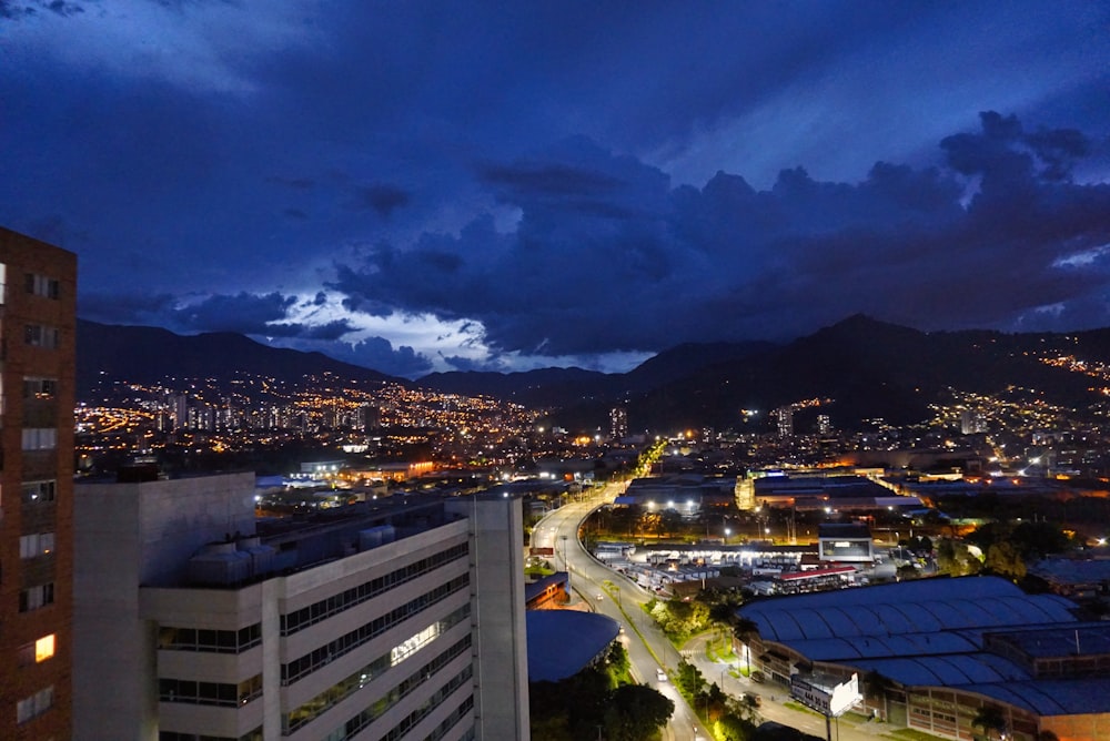 city with high rise buildings during night time