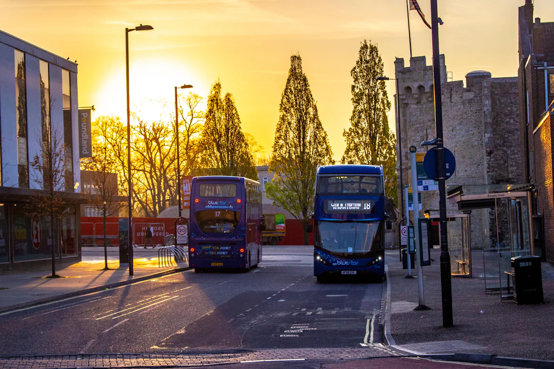 Buses on a Southampton street at sunset