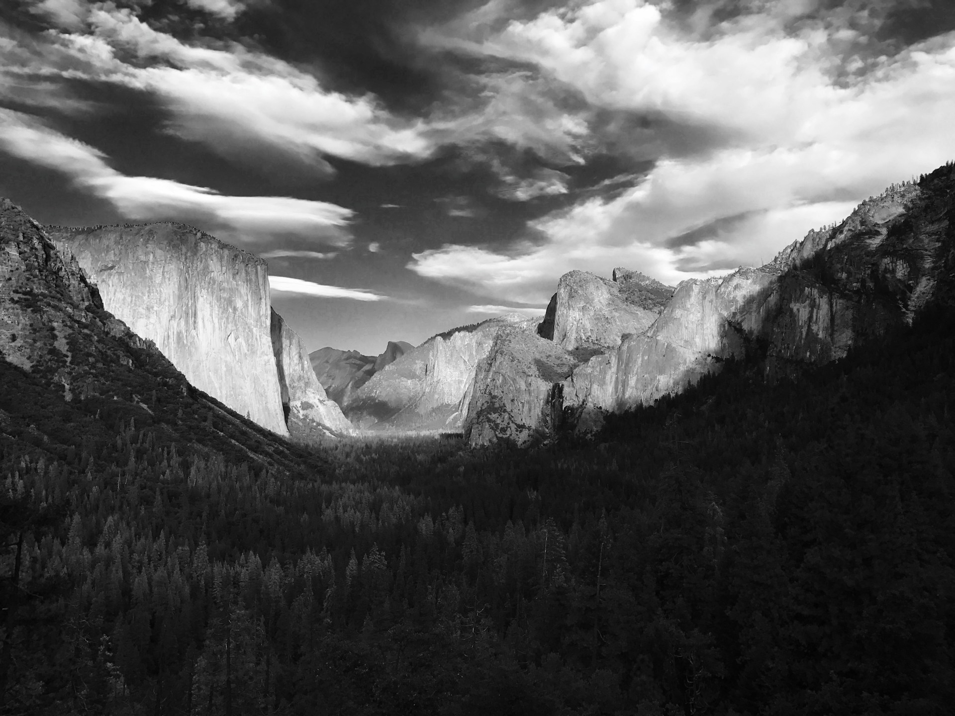 grayscale photo of rocky mountain