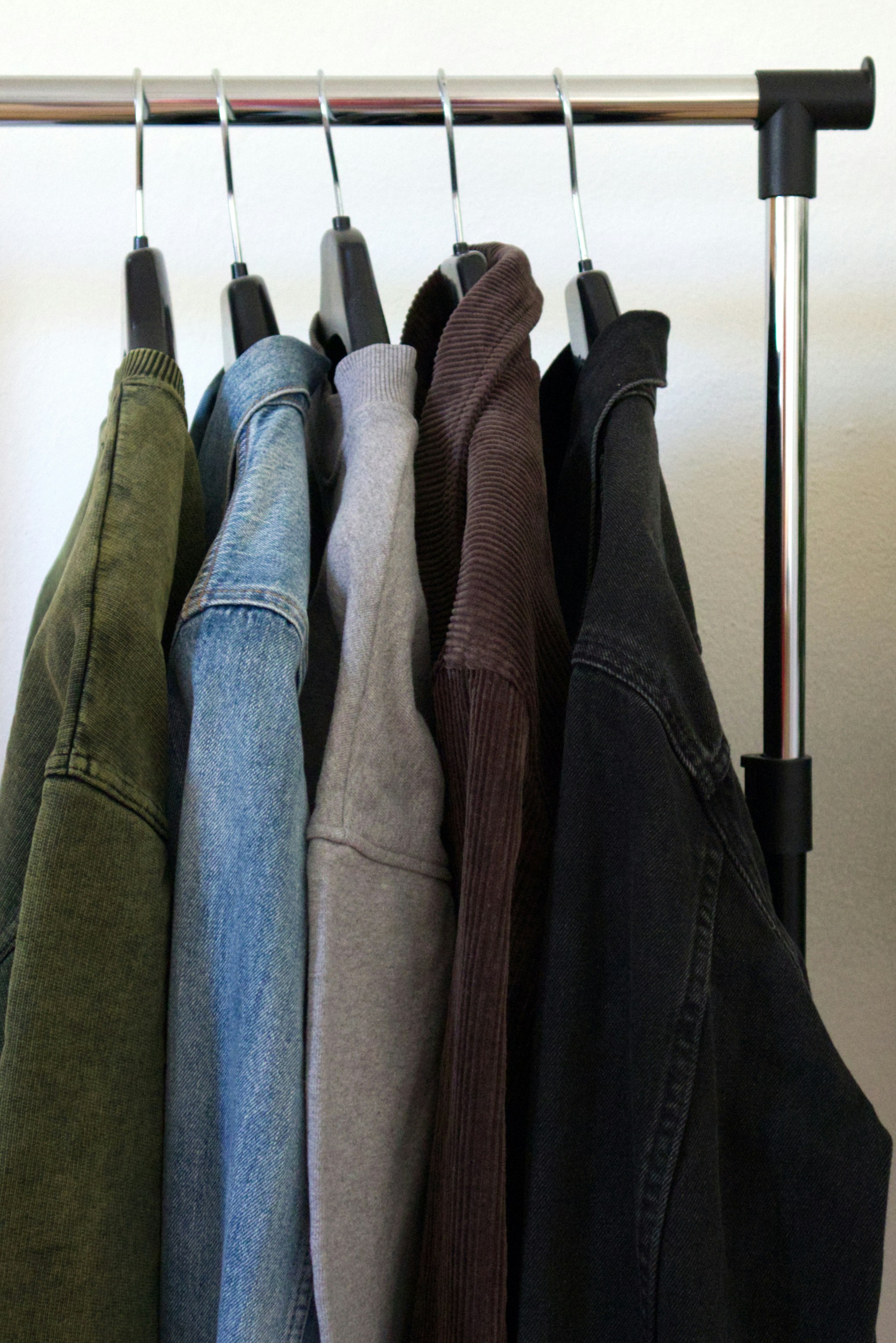 Variety of cargo pants, denim jeans, and maxi dresses