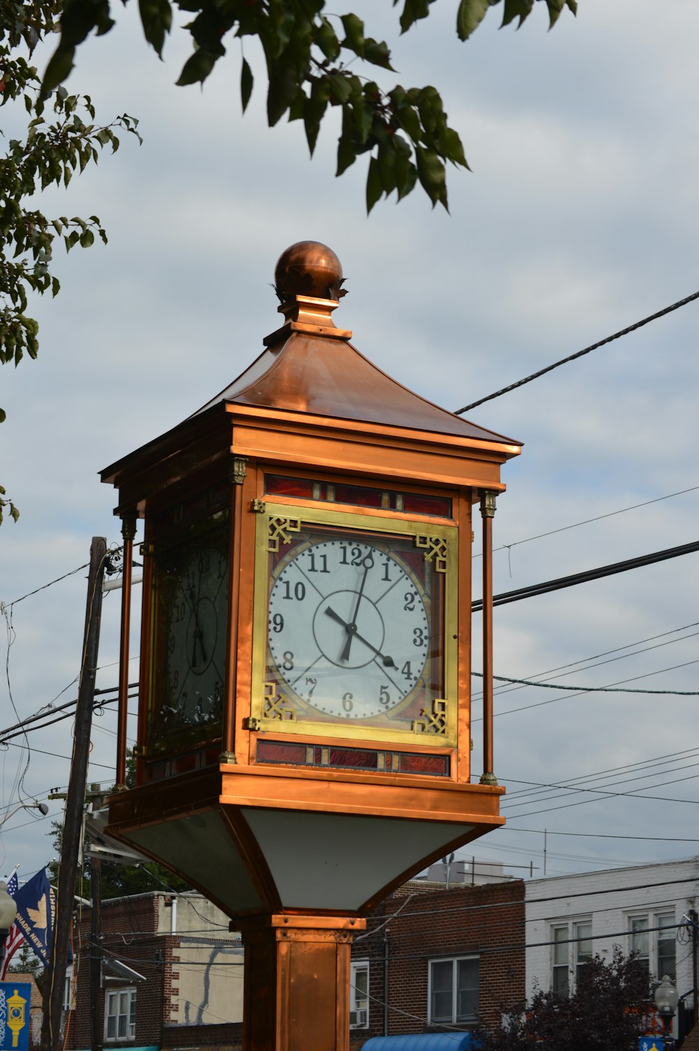 brown wooden framed analog clock