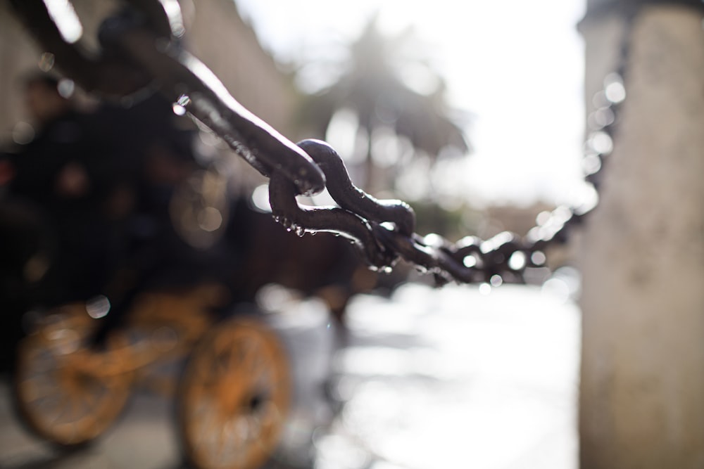 water droplets on black metal chain