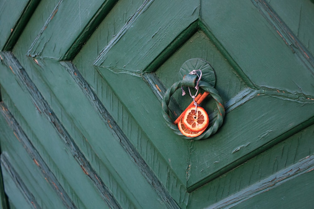 orange and black round wall ornament