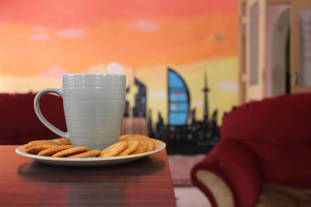 burger and fries on brown wooden table