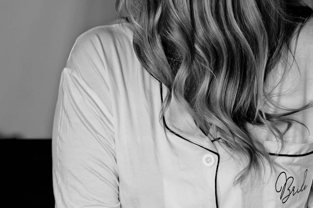 woman in white button up shirt