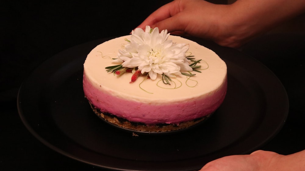 white and pink floral cake