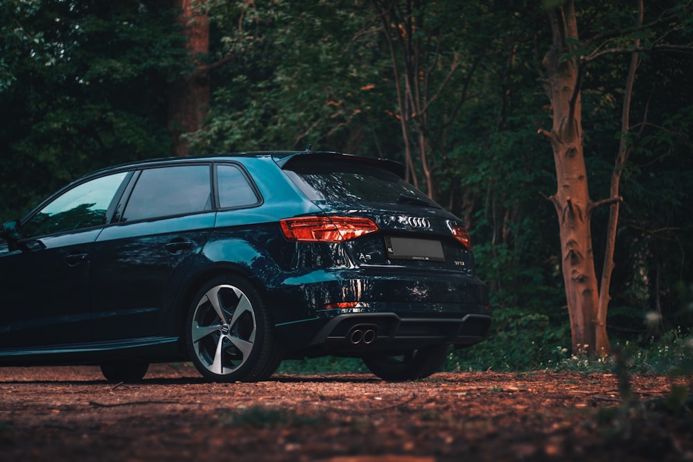 black honda car on forest during daytime