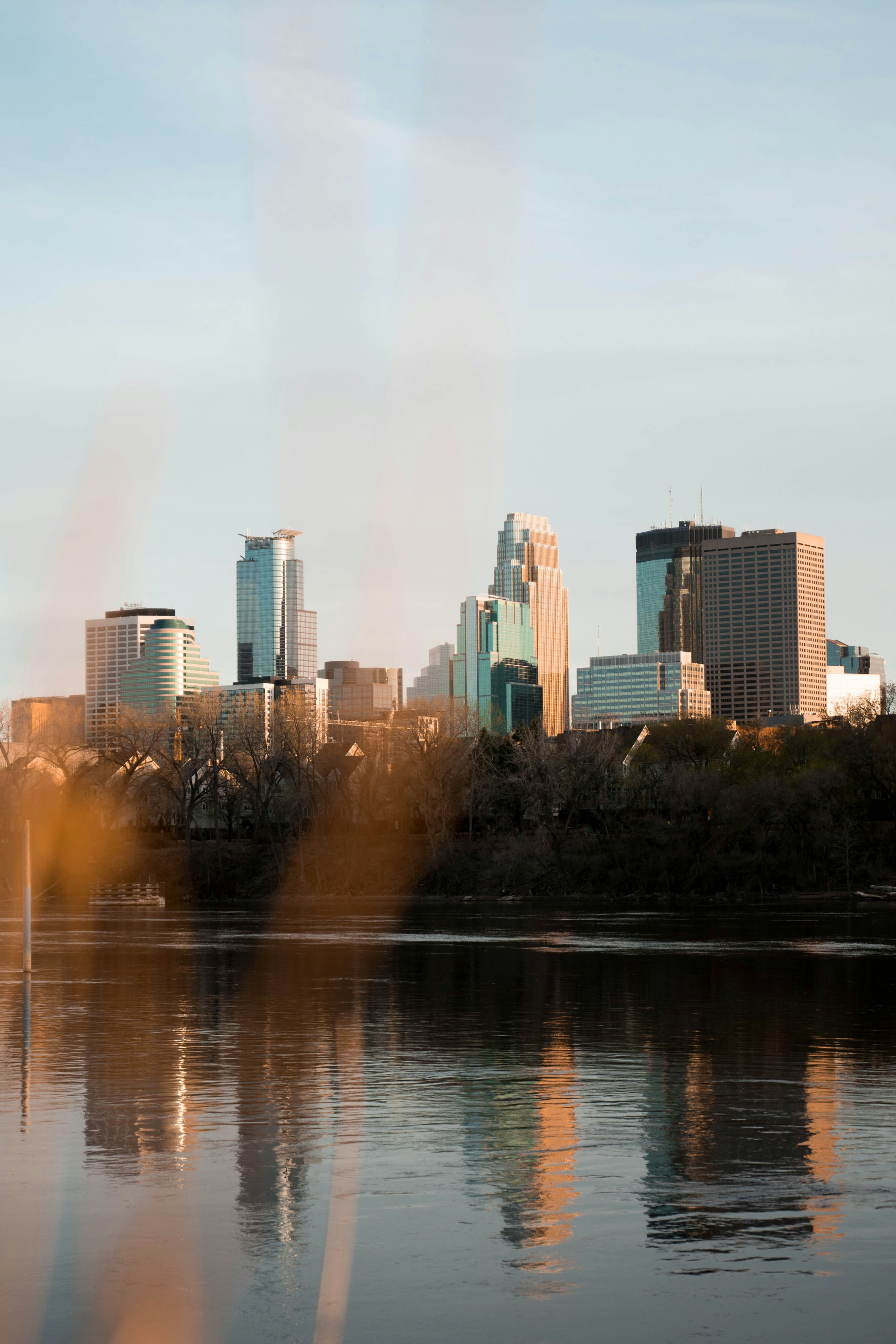 city skyline during foggy day