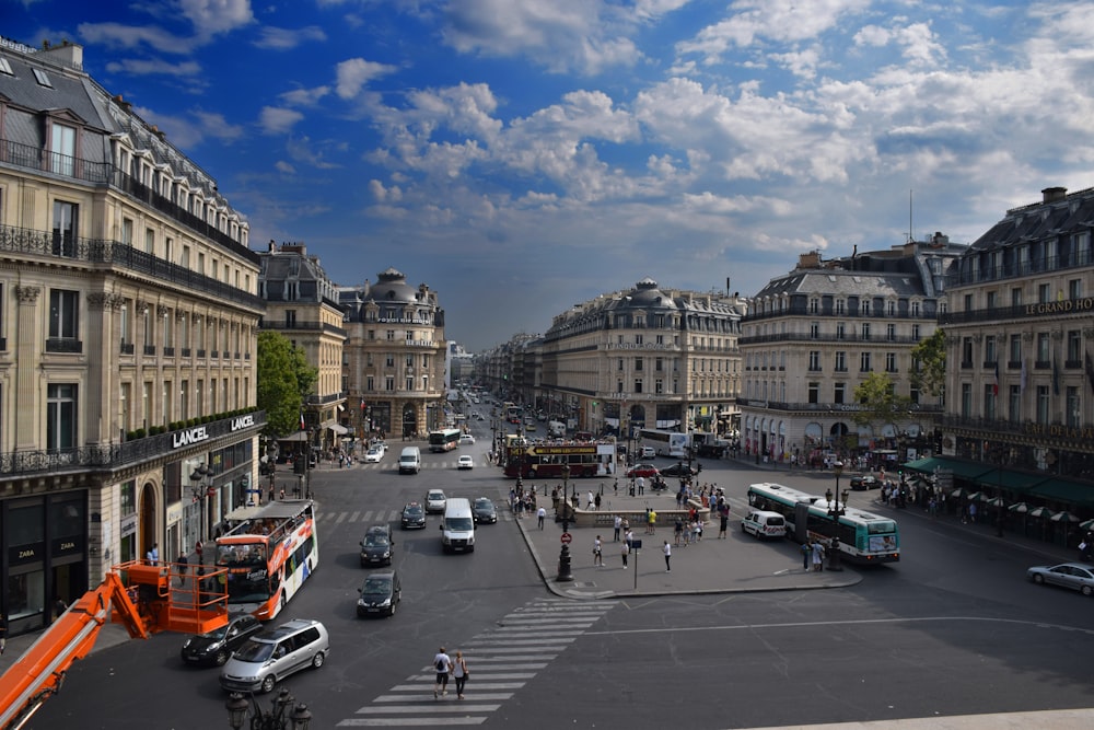 cars on road near buildings during daytime