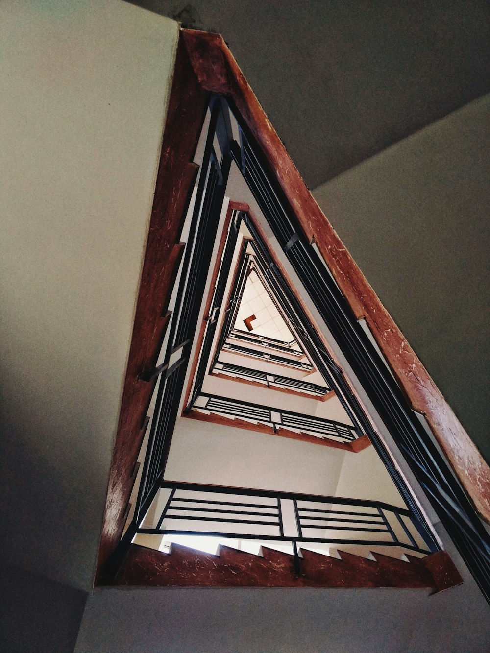 brown wooden framed glass window