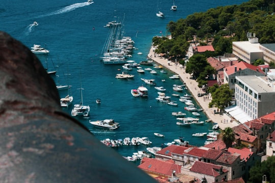 white boat on sea during daytime in Hvar Croatia