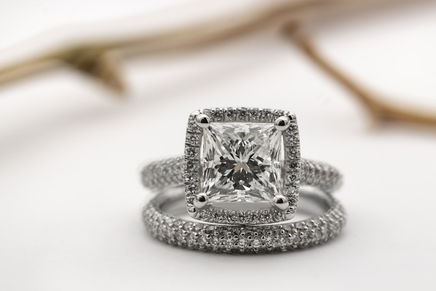 Marais eternity band stacked behind a solitaire