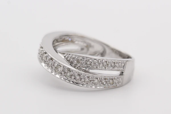 Silver crossover band ring with pavé-set stones