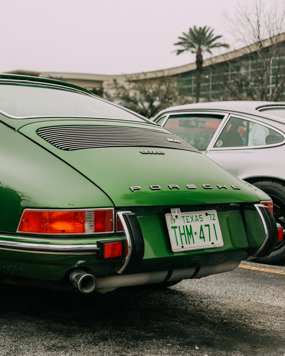 green mercedes benz coupe on road during daytime