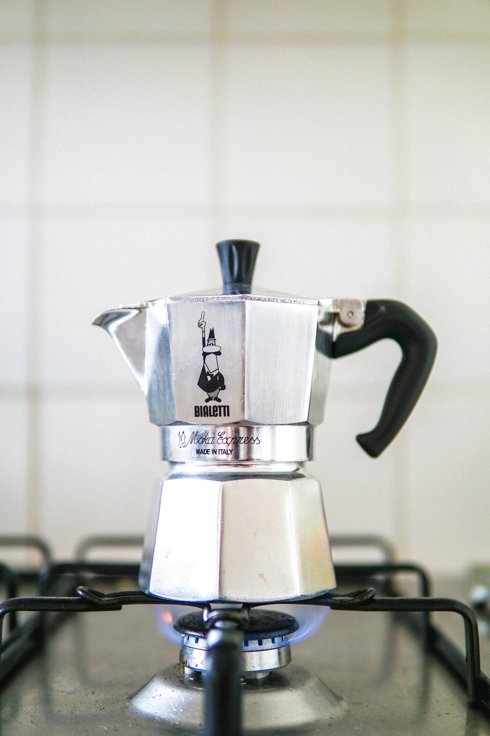 stainless steel espresso machine on table